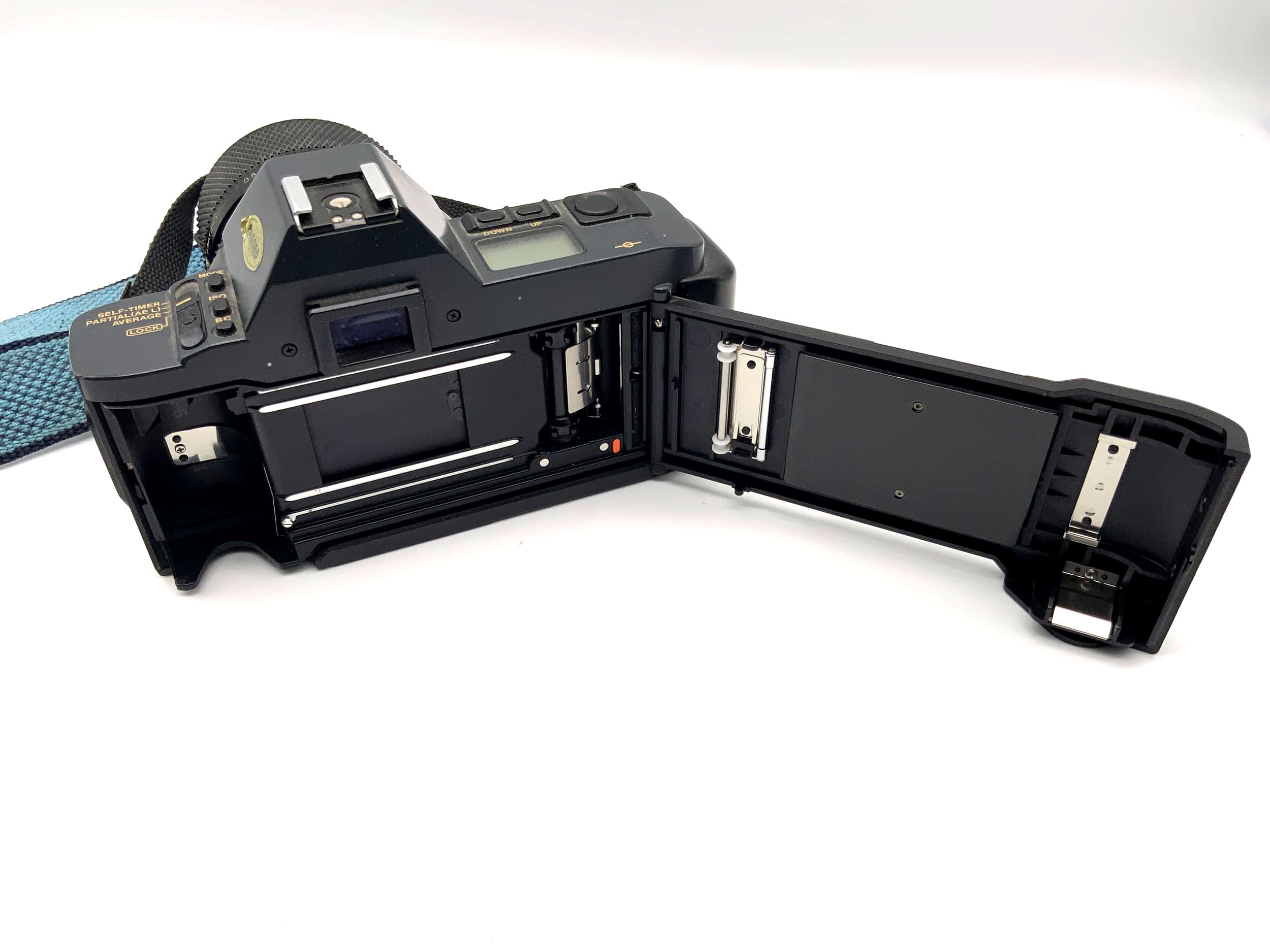 Canon T70 analog SLR camera with Soligor S/M 28-70mm 1:3.9-4.8 lens