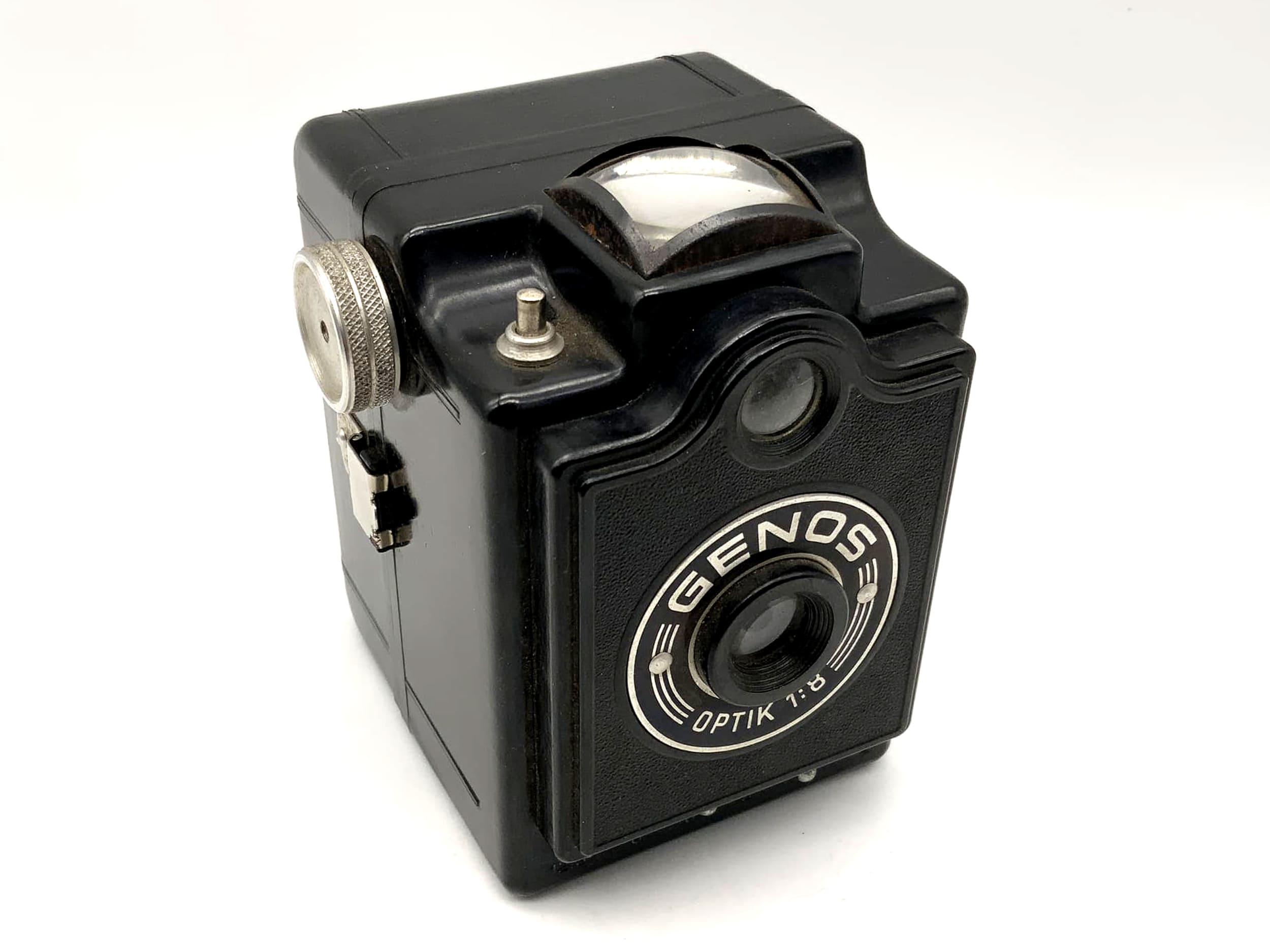Appareil photo analogique Genos Optik 1:8 Box avec pellicule en bakélite