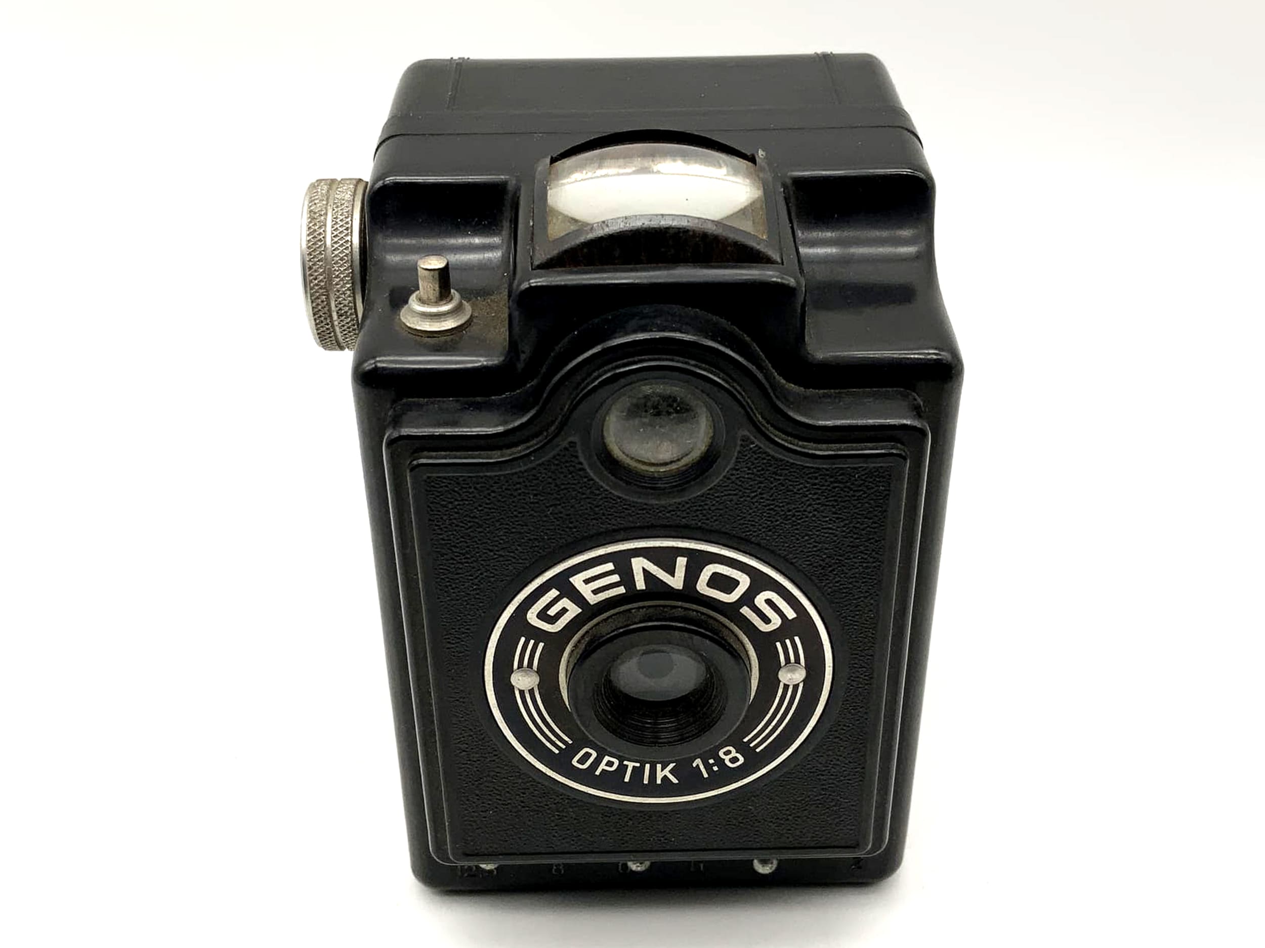 Appareil photo analogique Genos Optik 1:8 Box avec pellicule en bakélite