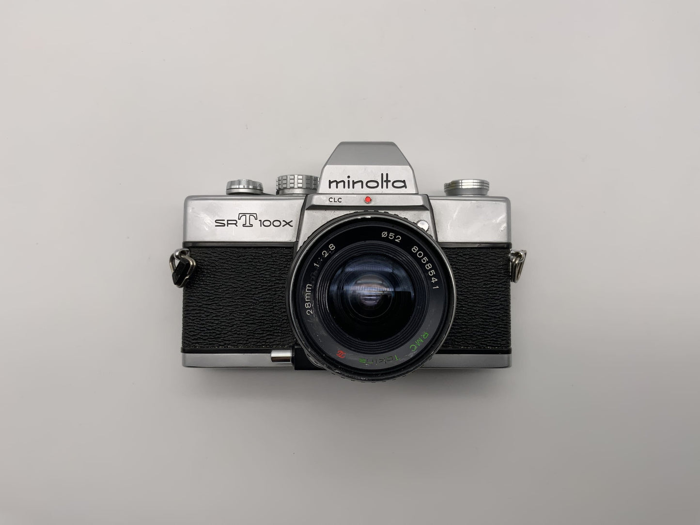 Minolta SRT 100x mit Tokina RMC 2.8 28mm Spiegelreflexkamera 35mm analog