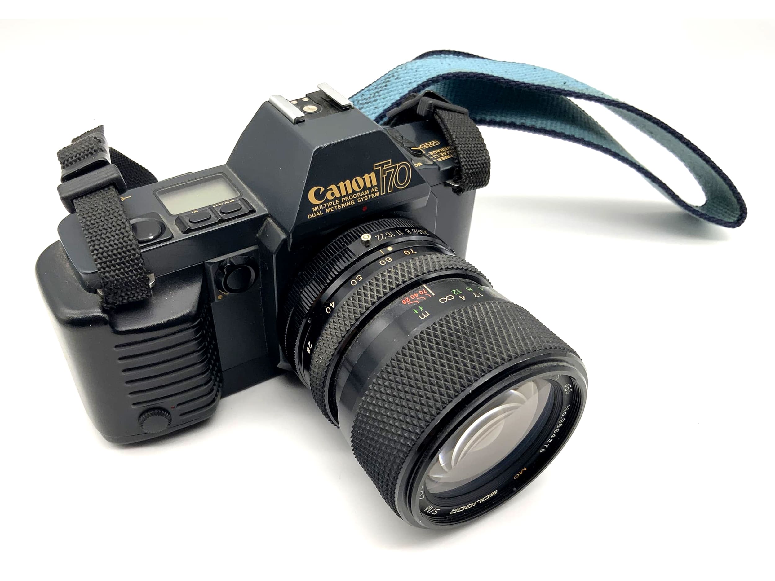 Appareil photo reflex analogique Canon T70 avec objectif Soligor S/M 28-70 mm 1:3,9-4,8