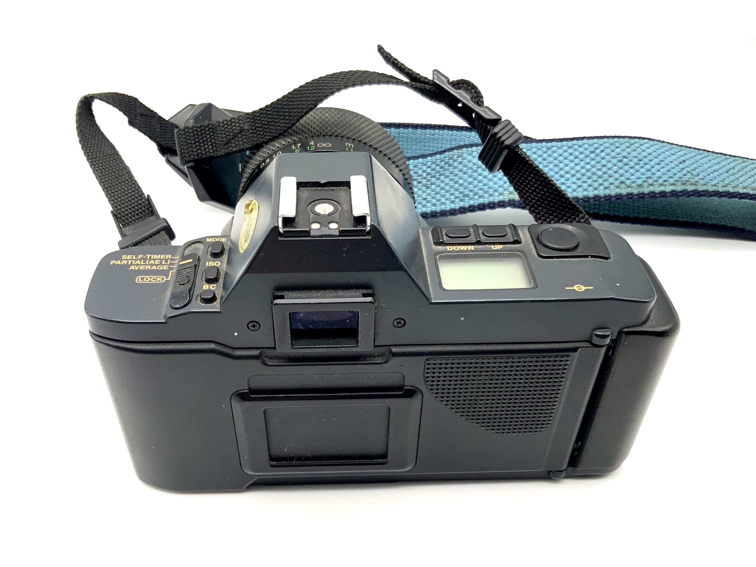 Canon T70 analog SLR camera with Soligor S/M 28-70mm 1:3.9-4.8 lens