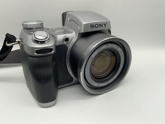 Sony Cybershot DSC-H1 mit Optical 12x Lens f=6.0-72.0mm 1:2.8-3.7 5.1 MP