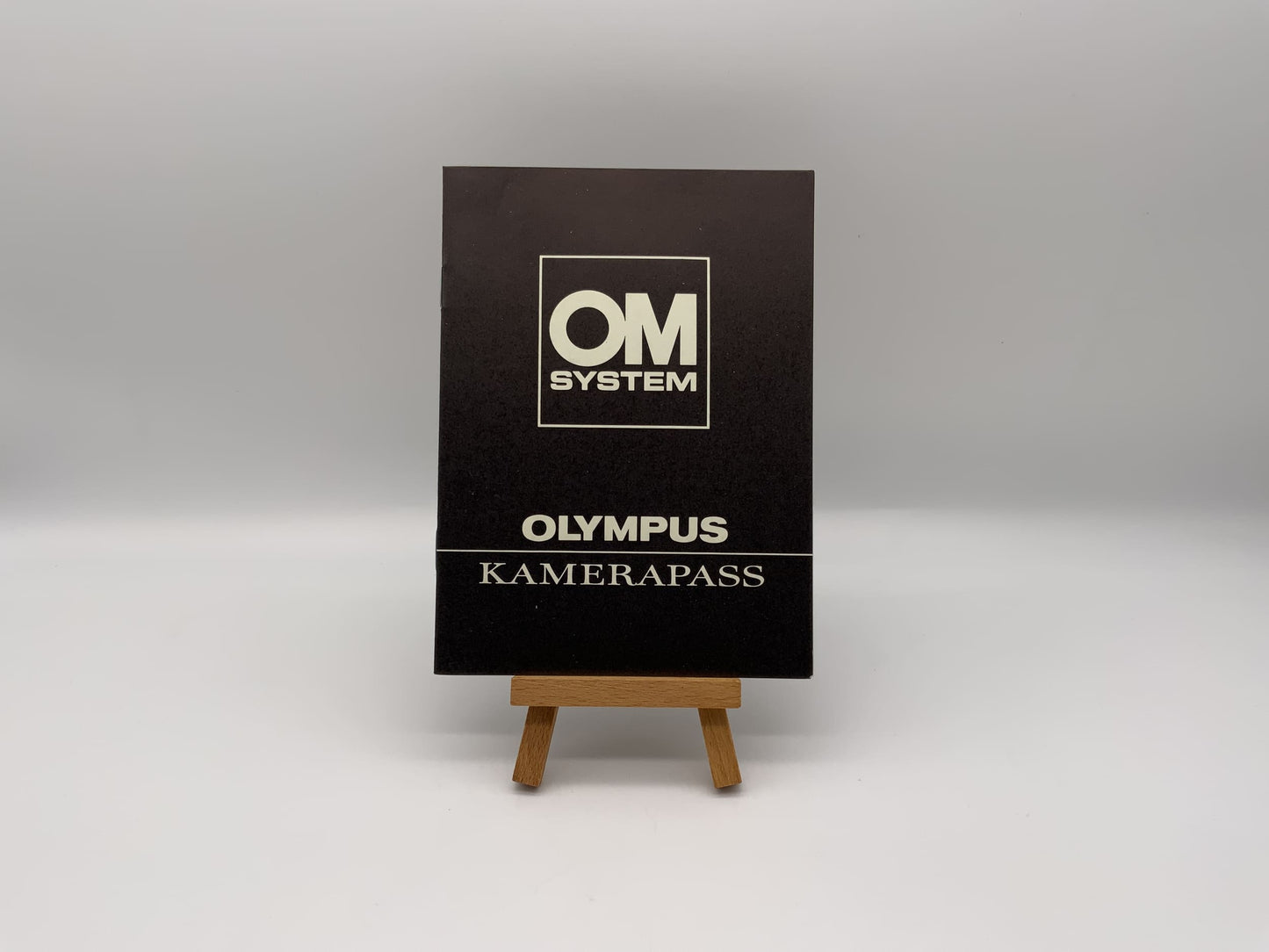 Olympus OM System Kamerapass Bedienungsanleitung Deutsch