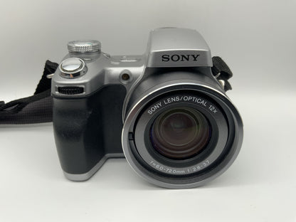 Sony Cybershot DSC-H1 mit Optical 12x Lens f=6.0-72.0mm 1:2.8-3.7 5.1 MP