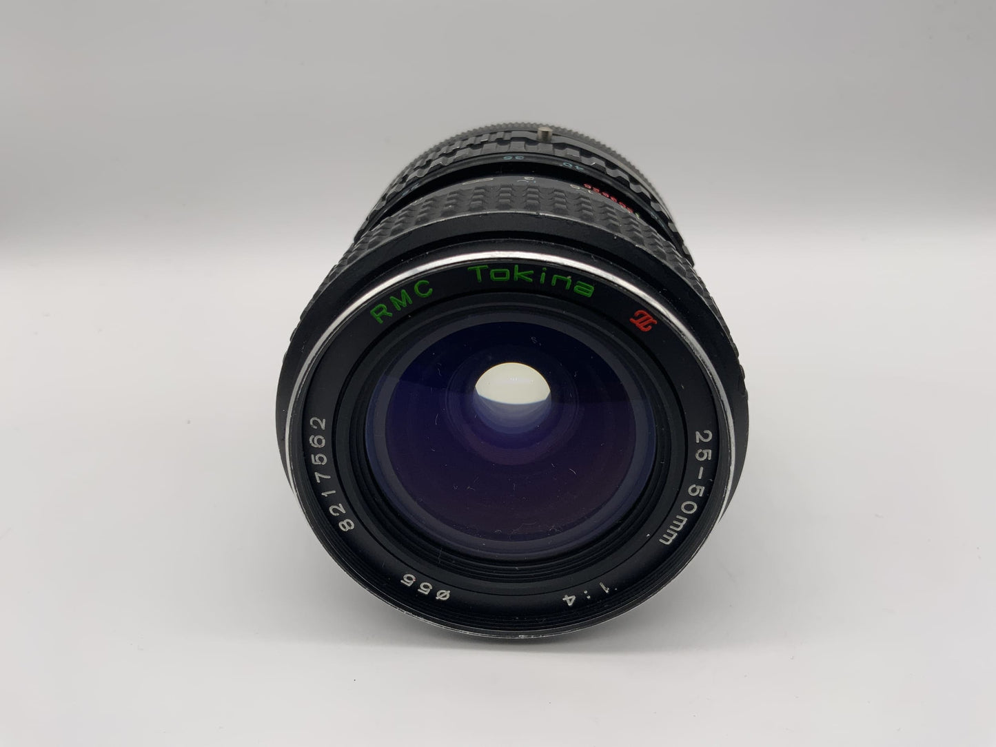 Tokina 25-50mm 1:4 Objektiv  RMC Kamera Lens (Canon FD) Nebel!