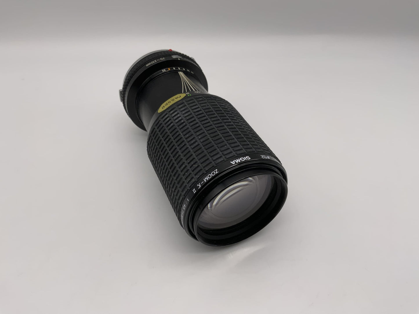 Objectif Sigma 70-210 mm 1:4,5 Zoom-K II Objectif d'appareil photo multicouche (Olympus OM)