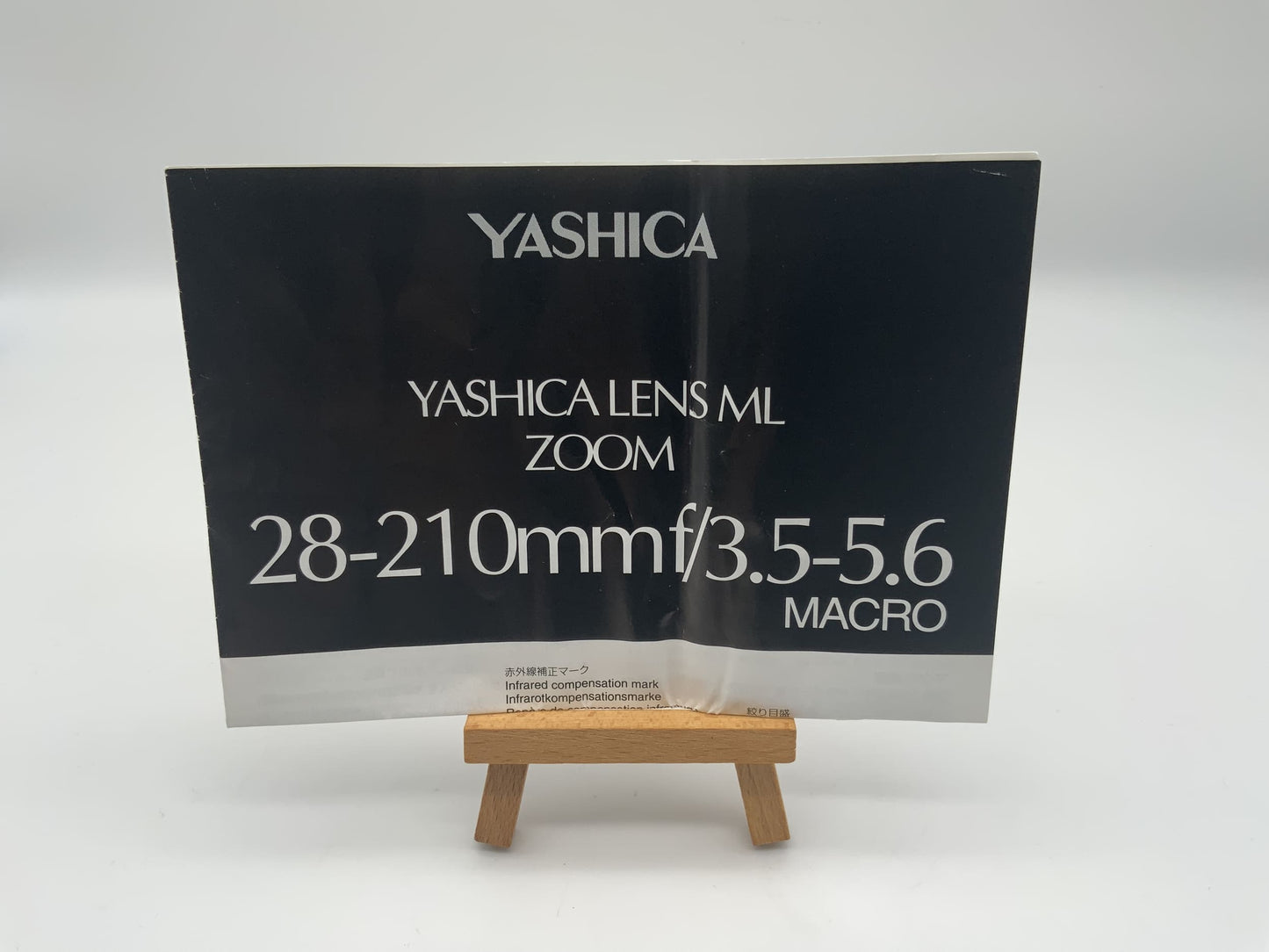 Yashica ML Zoom Lens 28-210mm f/3.5-5.6 Bedienungsanleitung